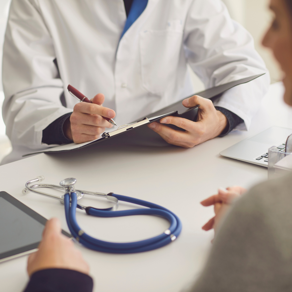 Doctor consulting patient